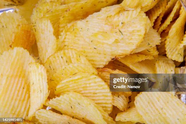 image of potato chips - crisps foto e immagini stock
