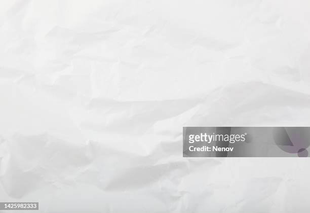 texture of crumpled white paper - pergament stock-fotos und bilder
