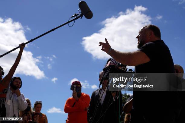 InfoWars founder Alex Jones speaks to the media outside Waterbury Superior Court during his trial on September 21, 2022 in Waterbury, Connecticut....