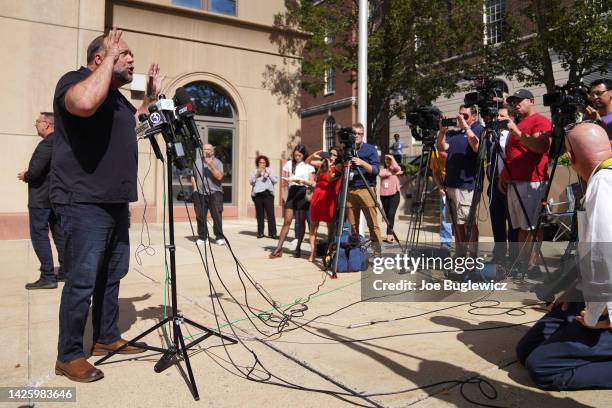 InfoWars founder Alex Jones speaks to the media outside Waterbury Superior Court during his trial on September 21, 2022 in Waterbury, Connecticut....