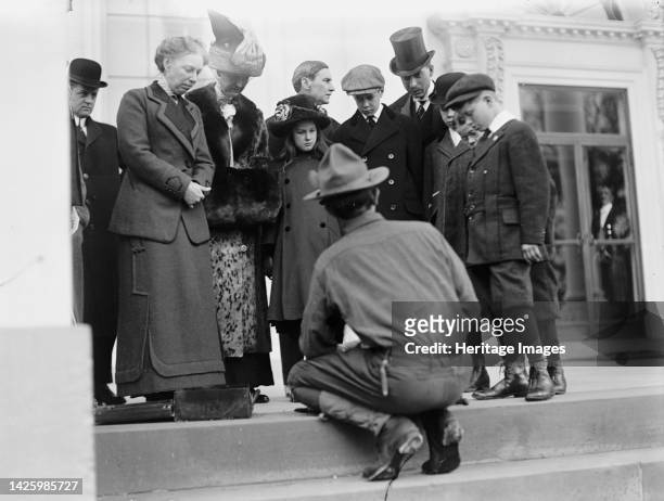 Boy Scouts - Visit of Sir Robert Baden-Powell To [Washington] D.C. Making Fire; Mrs. Taft Watching, 1911. [First Lady Helen Herron Taft observes...