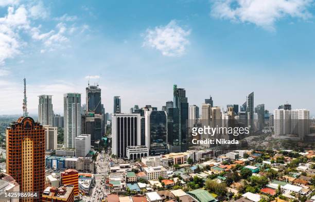skyline of manila, philippines - southeast stock pictures, royalty-free photos & images