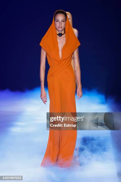 Model walks the runway of the Alberta Ferretti Fashion Show during the Milan Fashion Week Womenswear Spring/Summer 2023 on September 21, 2022 in...