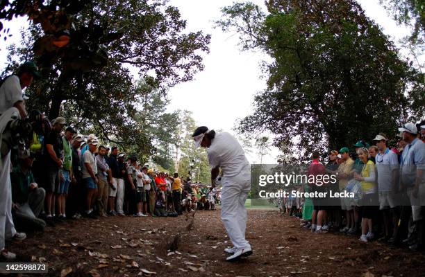 Bubba Watson of the United States plays at a shot from the rough on second sudden death playoff hole on the 10th during the final round of the 2012...