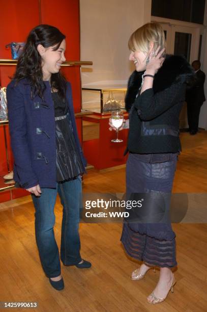 Cecilia Becker and Amy Astley attend Teen Vogue and Victoria Traina\'s holiday shopping event at Hogan Spring Street.