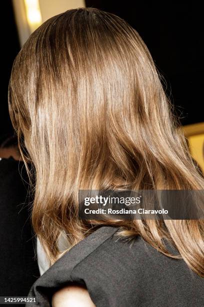 Model, hair detail, poses backstage at the Calcaterra Fashion Show during the Milan Fashion Week Womenswear Spring/Summer 2023 on September 21, 2022...