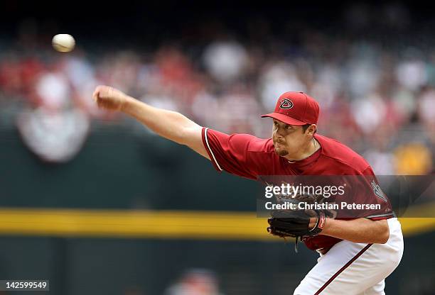 Relief pitcher Bryan Shaw of the Arizona Diamondbacks pitches against the San Francisco Giants during the MLB game at Chase Field on April 8, 2012 in...