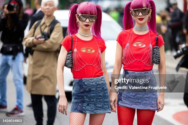 Ami Suzuki and Aya Suzuki of Amiaya are seen at Diesel show during the Milan Fashion Week - Womenswear Spring/Summer 2023 on September 21, 2022 in...