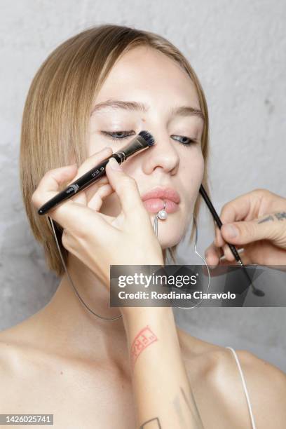 Model is seen during the make up in backstage at the AC9 Fashion Show during the Milan Fashion Week Womenswear Spring/Summer 2023 on September 21,...