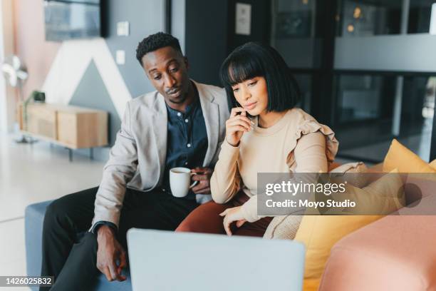 business people using a laptop in an office meeting to brainstorming ideas and plan a success strategy. creative corporate woman sitting with a male manager while thinking and planning idea together - about us stock pictures, royalty-free photos & images