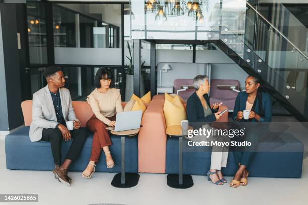 collaboration, talking and business people working and being social in workplace sofa in creative multitasking meetings. corporate worker team women in project conversation, planning or brainstorming - about us stock pictures, royalty-free photos & images