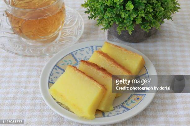 cassava steamed cake - traditional malay food stock pictures, royalty-free photos & images
