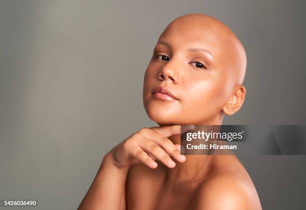 cancer survivor, face and beauty of a model posing in healthy and beautiful skin against a grey background. portrait of a woman in skincare wellness in support, advert or voice for cancerous patients - skin cancer face 個照片及圖片檔