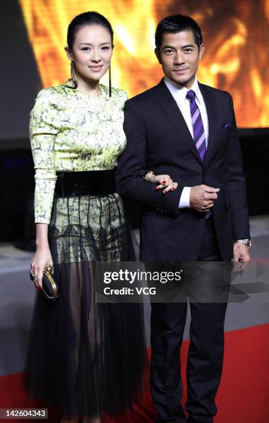 Actress Zhang Ziyi and actor Aaron Kwok attend the China Film Directors' Guild Award at the Olympic Sports Center on April 8, 2012 in Beijing, China.