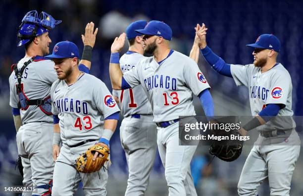 Chicago Cubs players celebrate after defeating the Miami Marlins at loanDepot park on September 21, 2022 in Miami, Florida.