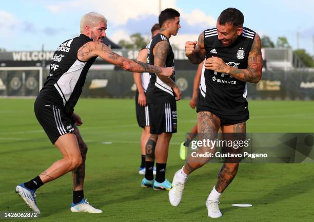 Rodrigo De Paul of Argentina jokes wit teammate Nicolás Otamendi of Argentina during a training session at Inter Miami Training Camp on September 21,...