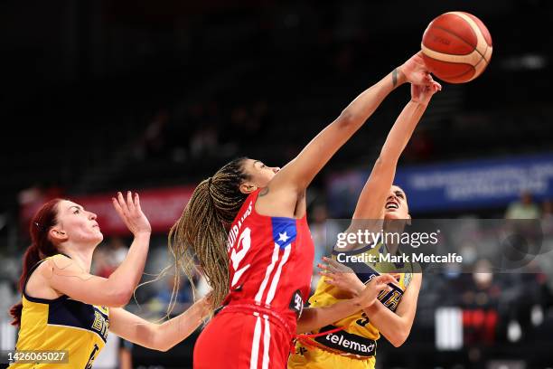 Miljana Dzombeta of Bosnia and Herzegovina and Arella Guirantes of Puerto Rico compete for a rebound during the 2022 FIBA Women's Basketball World...