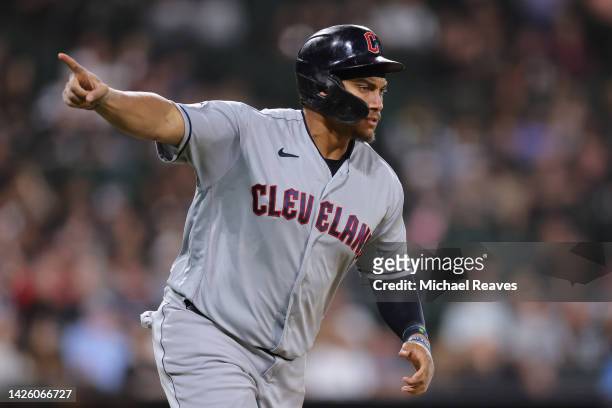 Josh Naylor of the Cleveland Guardians celebrates after hitting a two-run home run off Jose Ruiz of the Chicago White Sox during the seventh inning...