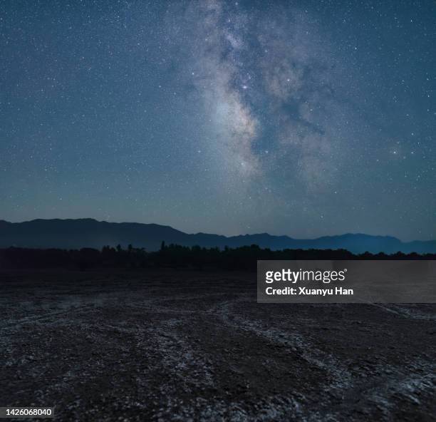 dry land under the stars - wilderness stock pictures, royalty-free photos & images