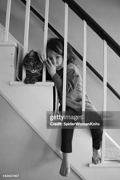 girl with cat - black and white cat stock pictures, royalty-free photos & images