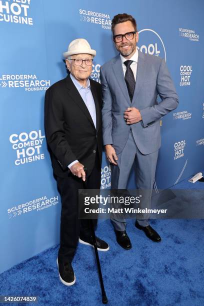 Norman Lear and Joel McHale attend Cool Comedy Hot Cuisine: A Tribute to Bob Saget at Beverly Wilshire, A Four Seasons Hotel on September 21, 2022 in...