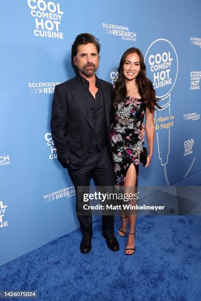 John Stamos and Caitlin McHugh attend Cool Comedy Hot Cuisine: A Tribute to Bob Saget at Beverly Wilshire, A Four Seasons Hotel on September 21, 2022...