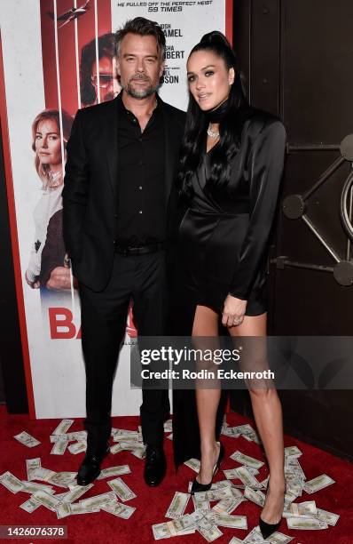 Josh Duhamel and Audra Mari attend the world premiere of "Bandit" at Harmony Gold on September 21, 2022 in Los Angeles, California.