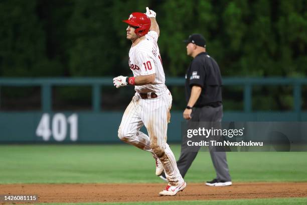 Realmuto of the Philadelphia Phillies rounds bases after hitting a solo home run during the eighth inning against the Toronto Blue Jays at Citizens...