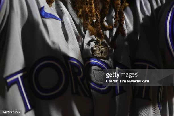 The uniform and chain of Vladimir Guerrero Jr. #27 of the Toronto Blue Jays is seen during the eighth inning against the Philadelphia Phillies at...