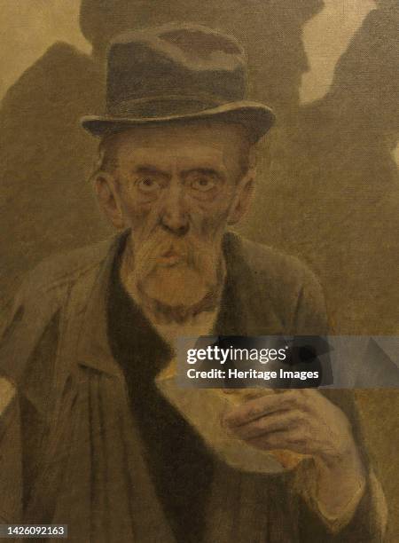 Vieil homme en haillons, de face, tenant un morceau de pain, circa 1904. Artist Fernand Pelez.