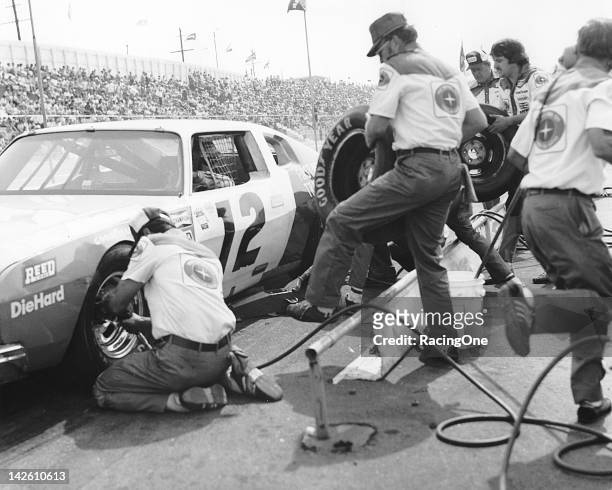 Bobby Allison pits his First National City Traveler’s Checks AMC Matador during a NASCAR Cup race.
