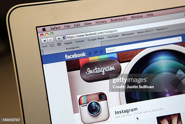 In this photo illustration, the photo-sharing app Instagram fan page is seen on the Facebook website on the Apple Safari web browser on April 9, 2012...