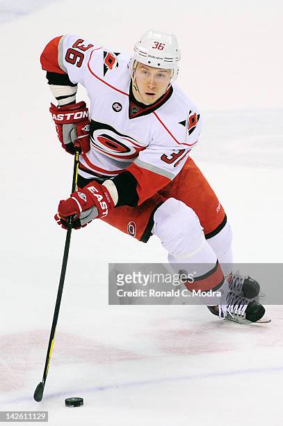 Jussi Jokinen of the Carolina Hurricanes skates with the puck during a NHL game against the Florida Panthers at the BankAtlantic Center on April 7,...
