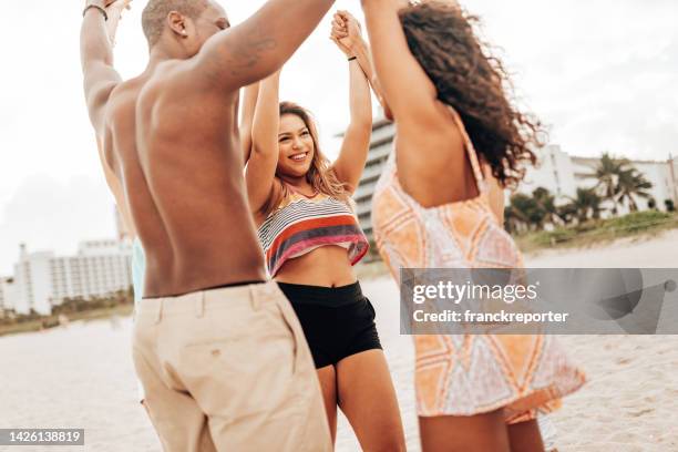 friends dancing on the beach - old florida nightclub stock pictures, royalty-free photos & images