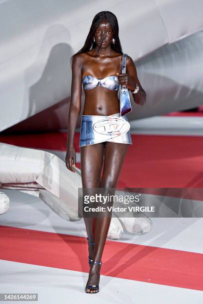 Model walks the runway during the Diesel Ready to Wear Spring/Summer 2023 fashion show as part of the Milan Fashion Week on September 21, 2022 in...