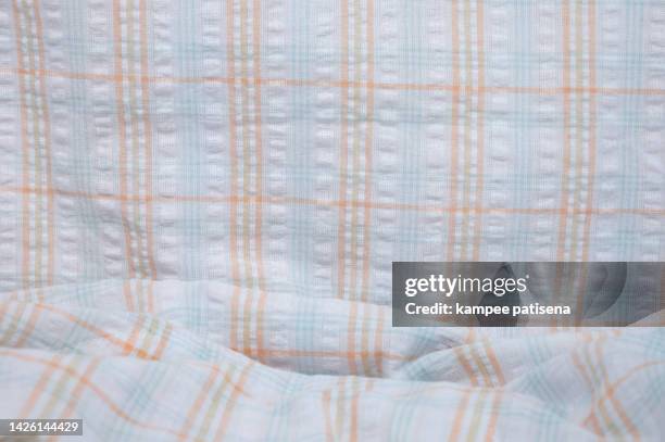 cotton sleepwear fabric background. - retro colorful checks shirt stock pictures, royalty-free photos & images