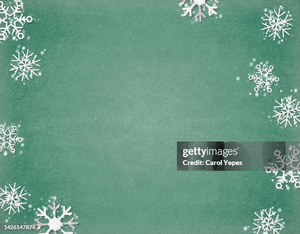 snowflakes frame in green surface. - blue felt stock pictures, royalty-free photos & images