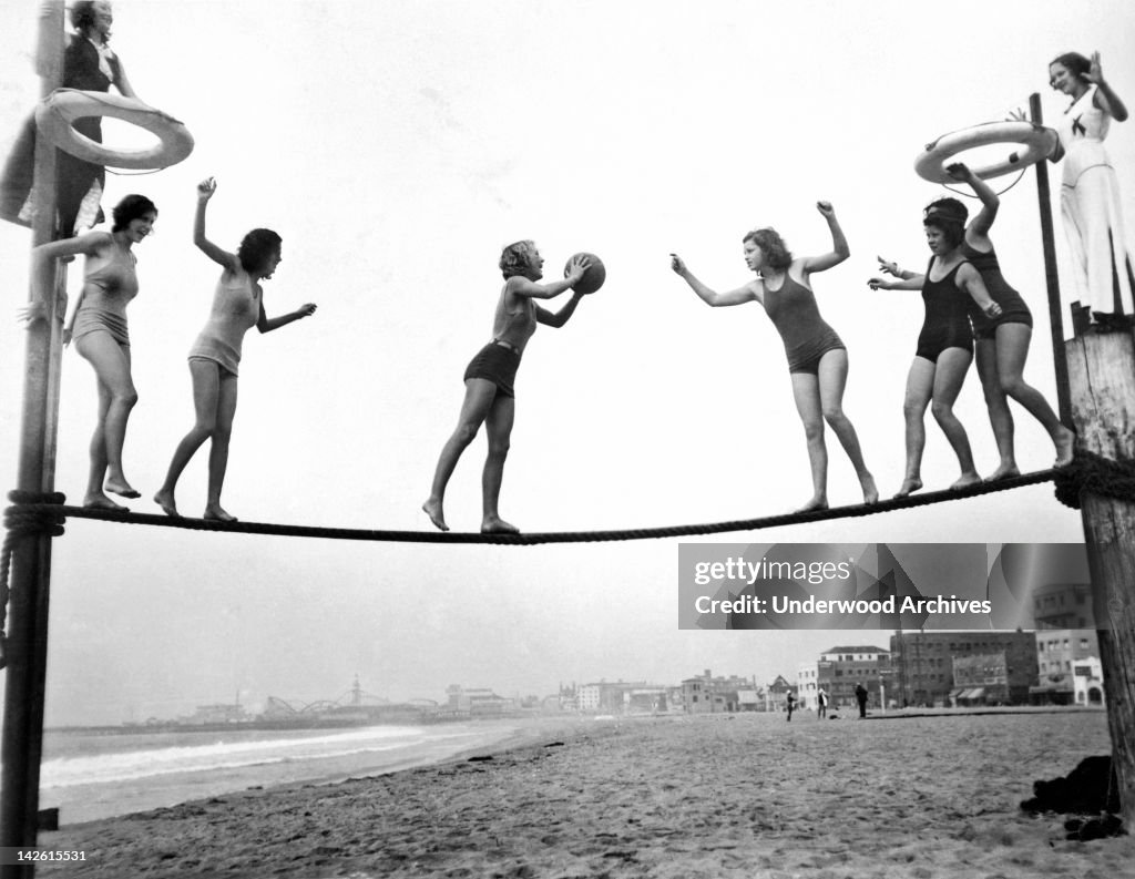 Women Play Beach Basketball