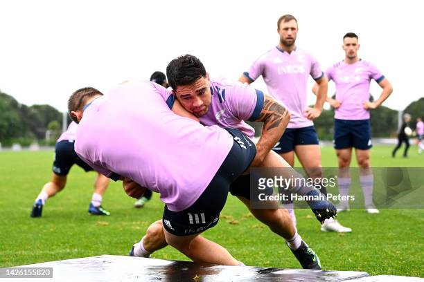 Codie Taylor of the All Blacks runs through drills during a New Zealand All Blacks training session at Mount Smart Stadium on September 22, 2022 in...