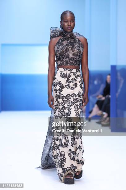 Model walks the runway of the Max Mara Fashion Show during the Milan Fashion Week Womenswear Spring/Summer 2023 on September 22, 2022 in Milan, Italy.
