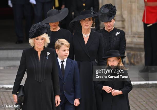 Camilla, Queen Consort, Meghan, Duchess of Sussex, Prince George of Wales, Catherine, Princess of Wales, Princess Charlotte of Wales and Sophie,...