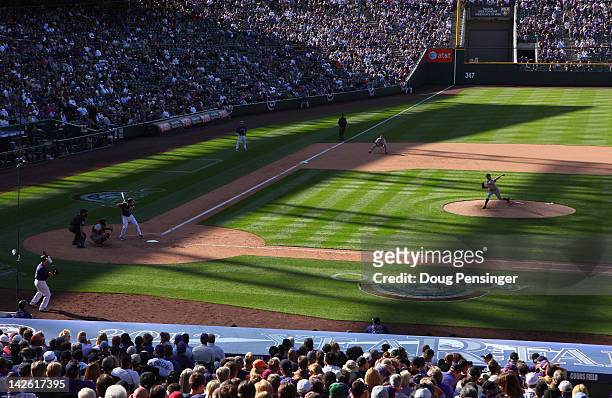 General view of the field as starting pitcher Barry Zito of the San Francisco Giants delivers against the Colorado Rockies on Opening Day at Coors...