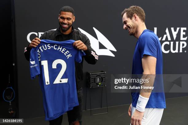 Andy Murray of Team Europe is presented with a Chelsea shirt by Ruben Loftus-Cheek of Chelsea on September 22, 2022 in London, England.