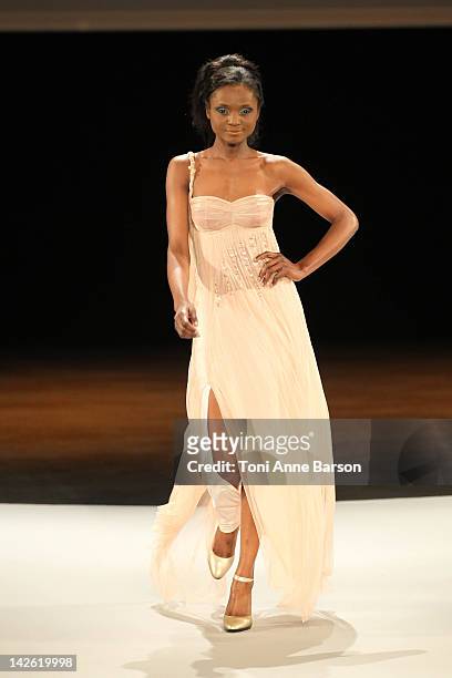 Model walks the runway for the Christophe Guillarme New Collection presentation at the Palais des Festivals on April 7, 2012 in Cannes, France.