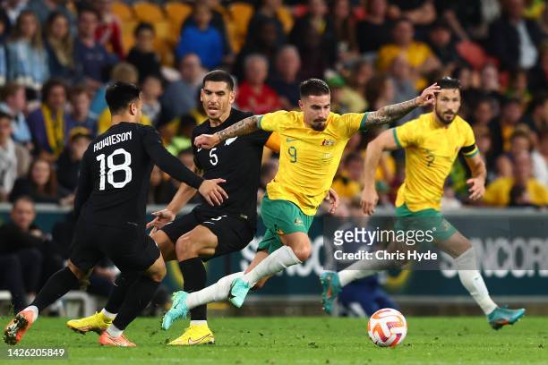 Jamie Maclaren of Australia kicks during the International Friendly match between the Australia Socceroos and the New Zealand All Whites at Suncorp...