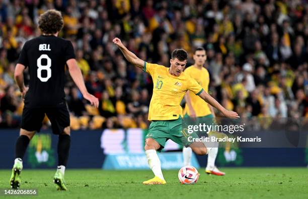 Ajdin Hrustic of Australia strikes the ball during the International Friendly match between the Australia Socceroos and the New Zealand All Whites at...