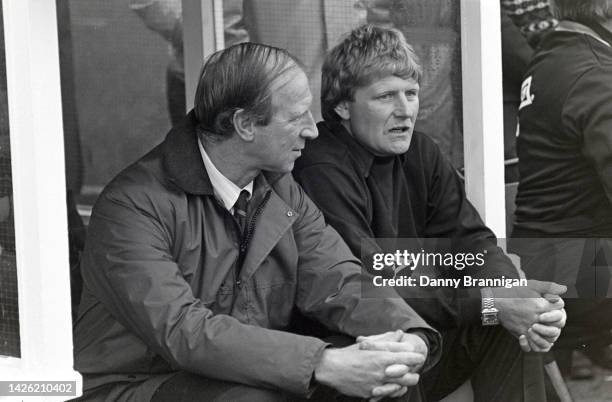 Newcastle United manager Jack Charlton and coach Willie McFaul look on from the bench before a match against Luton Town at St James' Park on February...