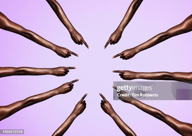 circle of womans arms pointing - feeling guilty stock pictures, royalty-free photos & images