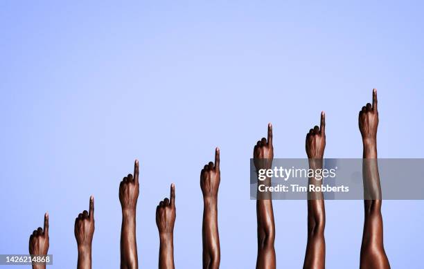 graph of arms pointing upwards - index finger stock pictures, royalty-free photos & images