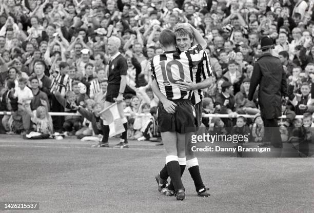 Newcastle United goal scorer David Kelly is congratulated by Lee Clark after scoring the second goal in a 3-1 home win against Portsmouth at St...